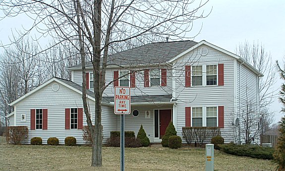 4 bedrooms or 3 bedrooms and loft. Covered front porch. 2 story sunk-in family room. Formal living and dining rooms. 1st floor laundry. 2-car garage.