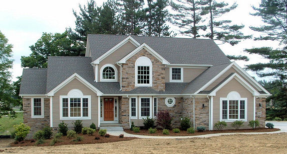 1st floor master with cathedral ceiling and optional fireplace. 2 story foyer and great room. Loft and bridge overlooking great room. Large kitchen with vaulted morning room and walk-in pantry. Boxed ceiling and French doors in parlor/den. Formal dining room with tray ceiling. Covered front porch. 1st floor laundry. 3-car side-entry garage.