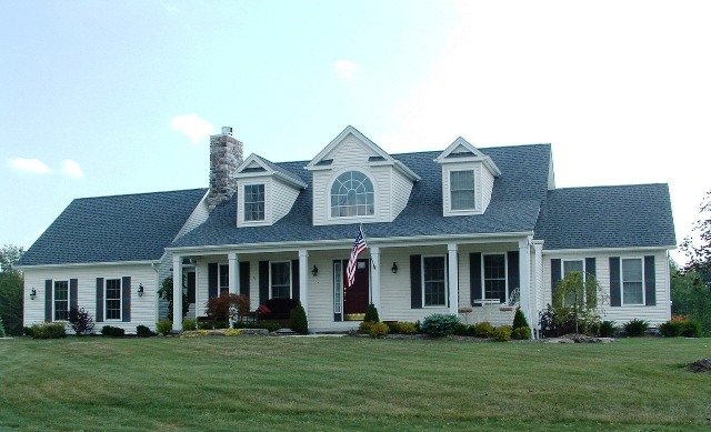 1st floor master bedroom and bath, both with cathedral ceilings. Large master shower and corner tub. Large master walk-in closet. 1st floor parlor/den or 4th bedroom with French doors. Arched openings. Loft overlooking 2-story foyer and great room. Tray ceiling in bayed dining room. Curio cabinet in foyer. Large breakfast bar in kitchen. Large covered front porch with columns. 1st floor utility with rear door. Convenient mud room and powder room. 2-car garage. 